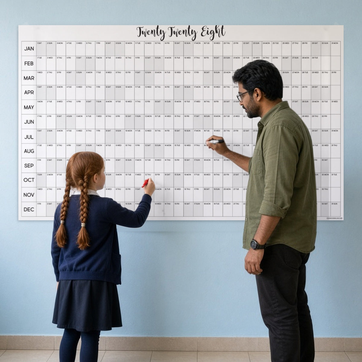 2028 horizontal yearly wall calendar in a classroom with teacher and student