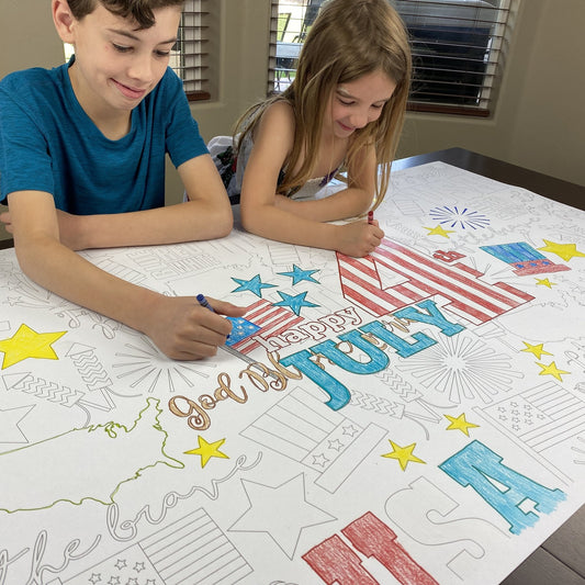 Kids coloring the 4th of July Table Size Coloring Sheet at home