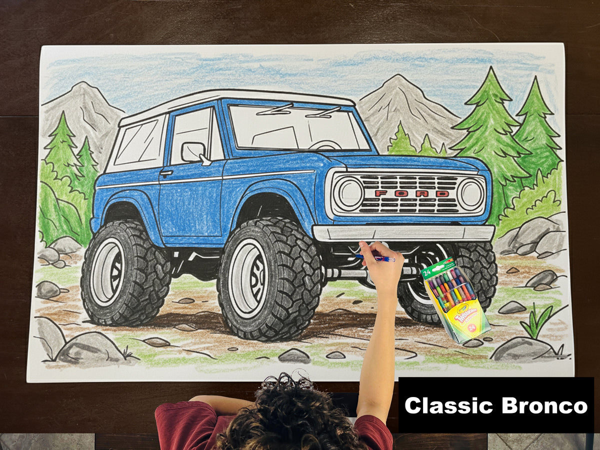 Colored-in giant coloring sheet of a classic off-road SUV, with crayons