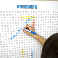Thumbnail for Close-up of a classic TV sitcom themed giant word search with found words circled in color