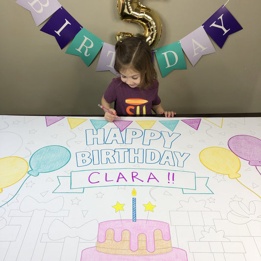 Kids coloring the Birthday Bash Coloring Banner at home