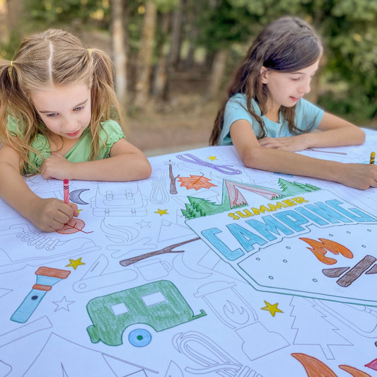 Kids coloring the Camping Table Size Coloring Sheet at home