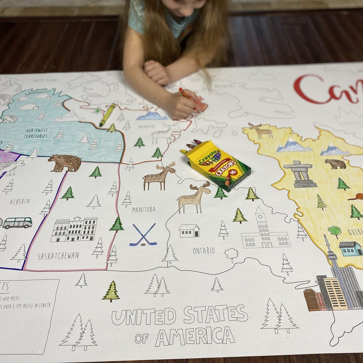 The Canada Coloring Map being colored by kids at home