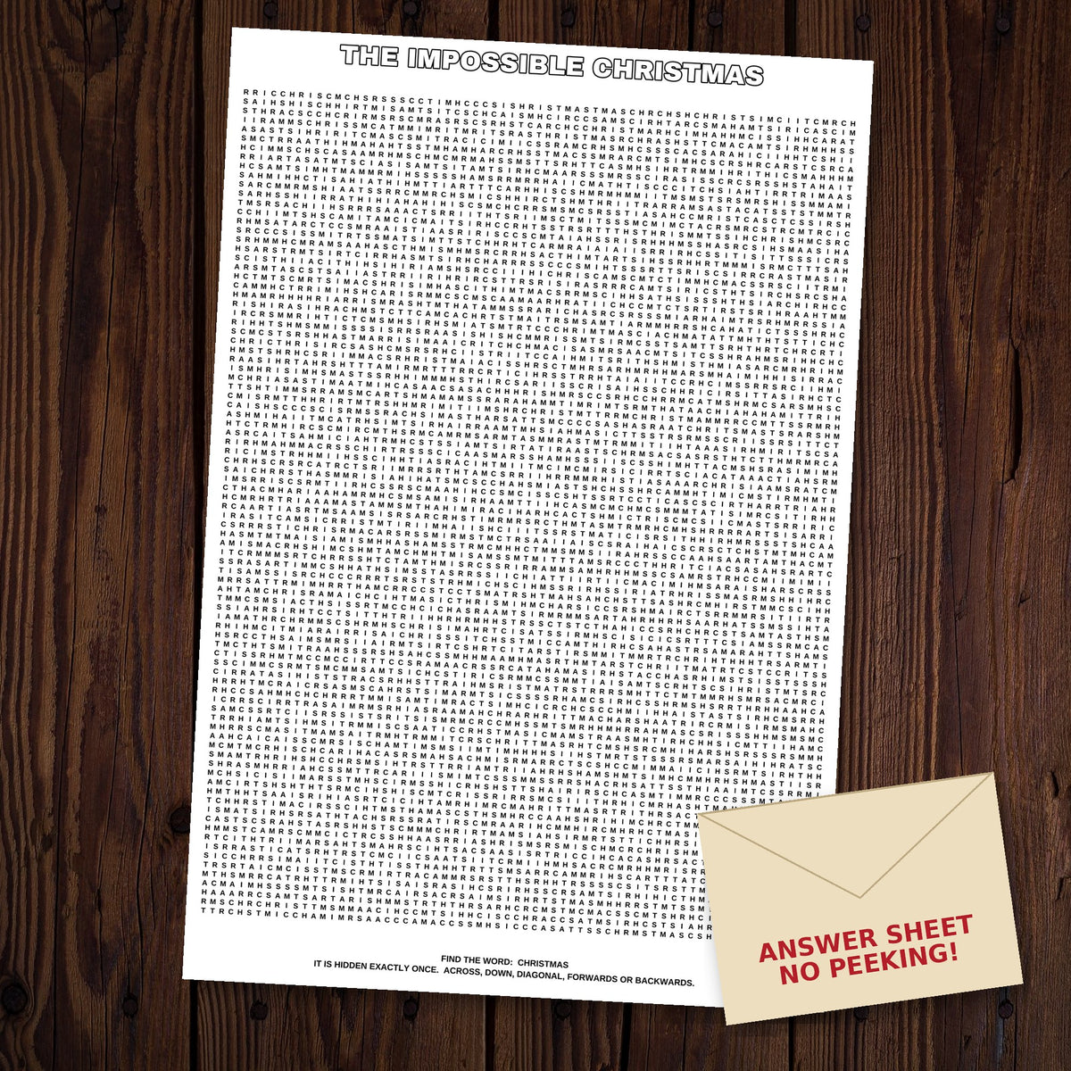 The Impossible Christmas giant word search sheet laid out on a dark wood floor