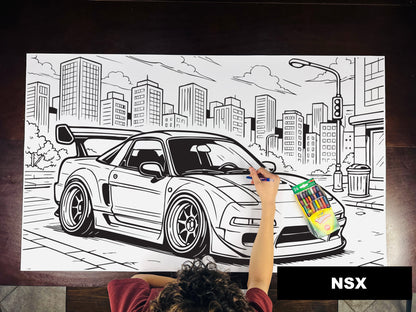 Giant coloring sheet of a sports car on a city street, with a box of crayons