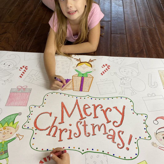 Kids coloring the Elves Table Size Coloring Sheet at home