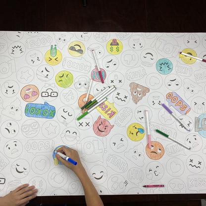 The Emoji Table Size Coloring Sheet being colored by kids at home