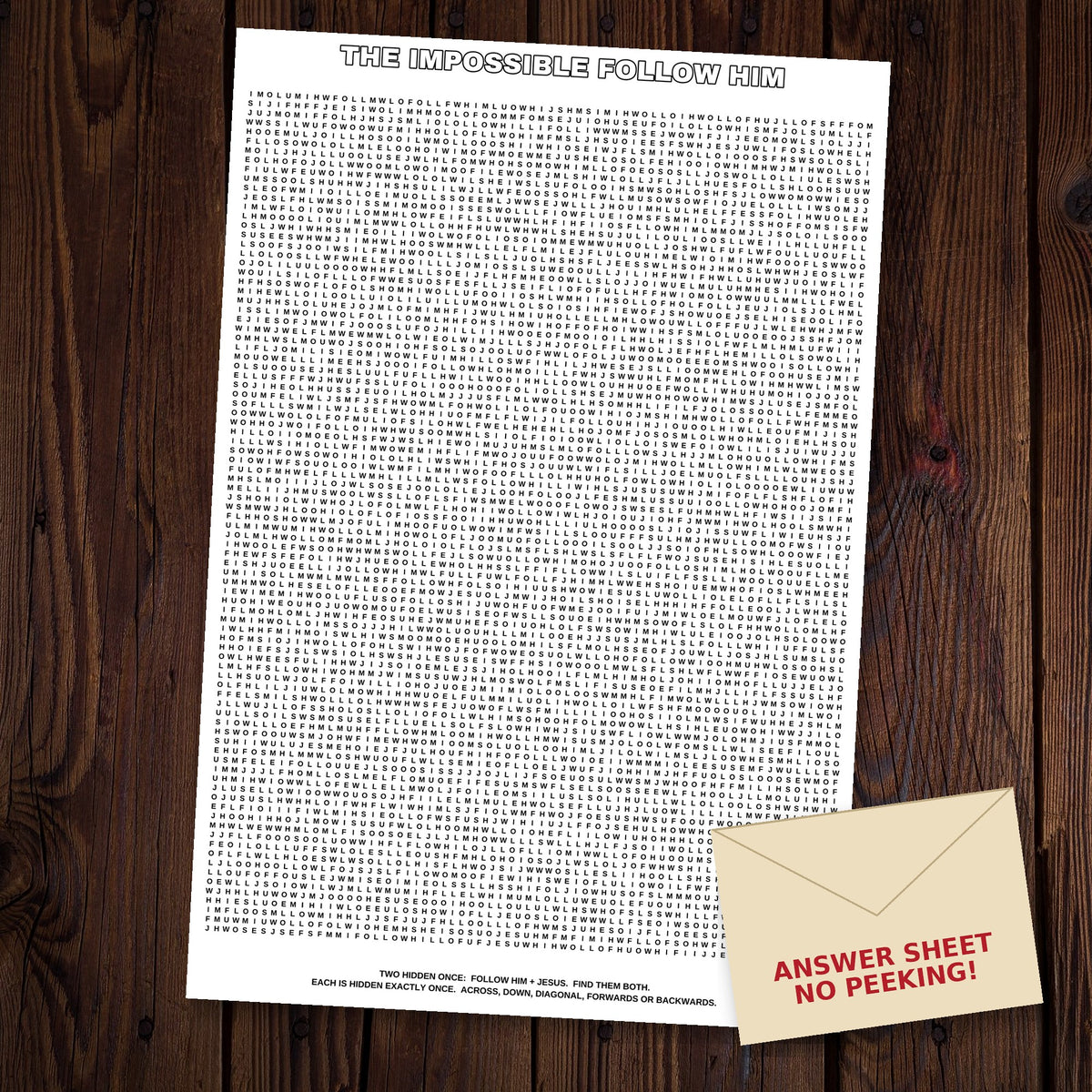 The Impossible Follow Him giant word search sheet laid out on a dark wood floor