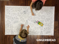 Thumbnail for Child coloring the Gingerbread giant coloring sheet on a wood floor with crayons