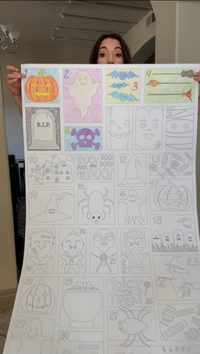 Thumbnail for Halloween Countdown calendar coloring sheet hung on a wall, partly colored in