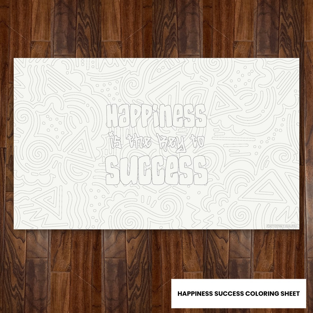 Happiness Success giant 30x50 coloring sheet laid flat on a wood floor