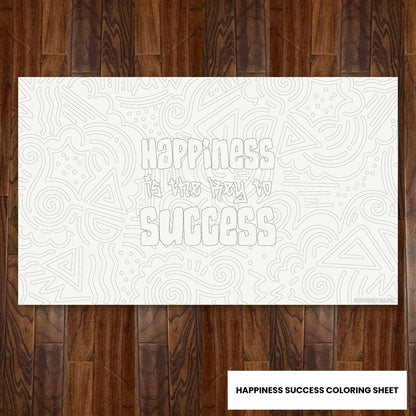 Happiness Success giant 30x50 coloring sheet laid flat on a wood floor