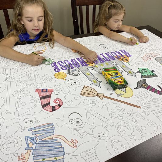 Kids coloring the Haunted House Table Size Coloring Sheet at home