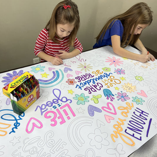 Kids coloring the Love Yourself Table Size Coloring Sheet at home