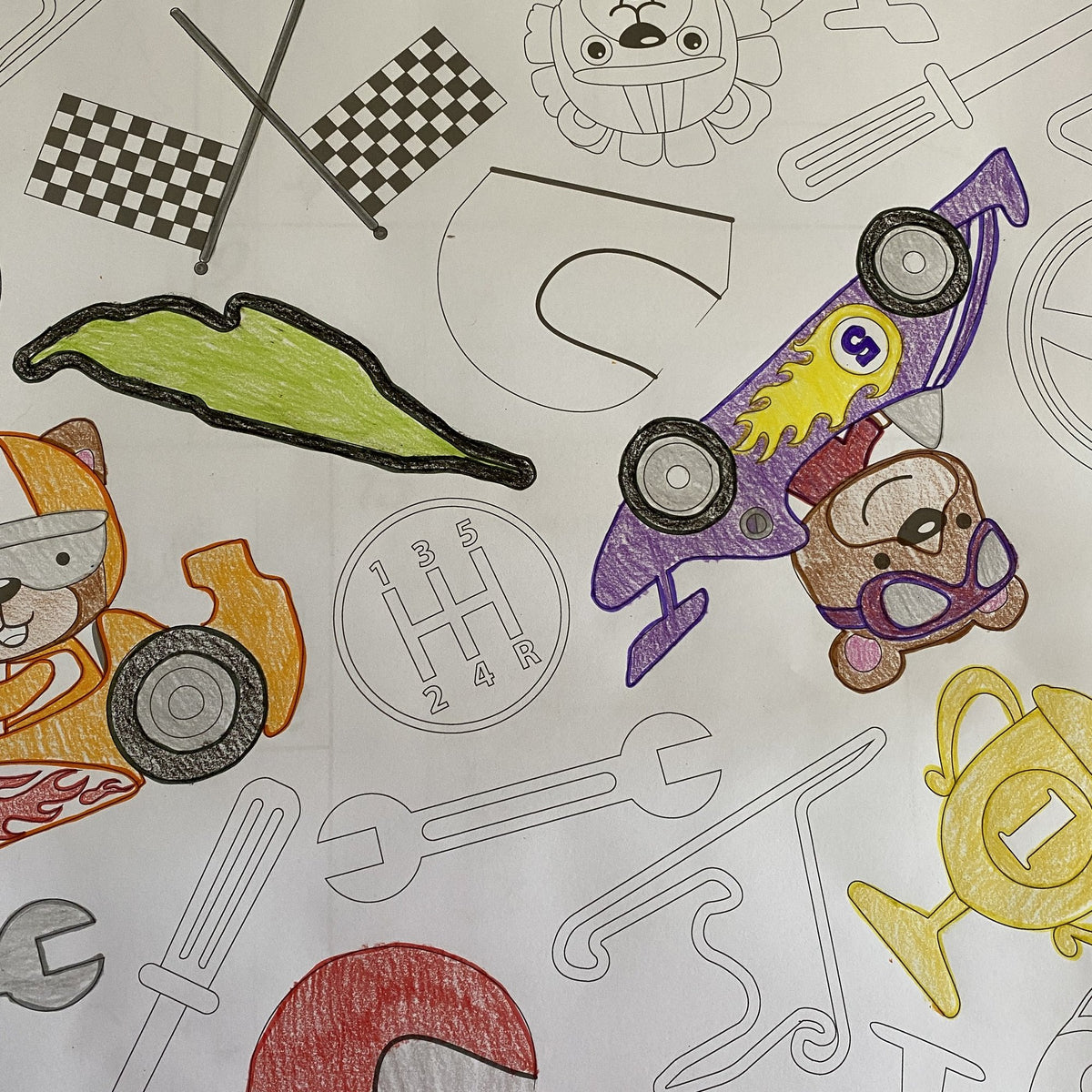 Kids coloring the Race Car Table Size Coloring Sheet at home
