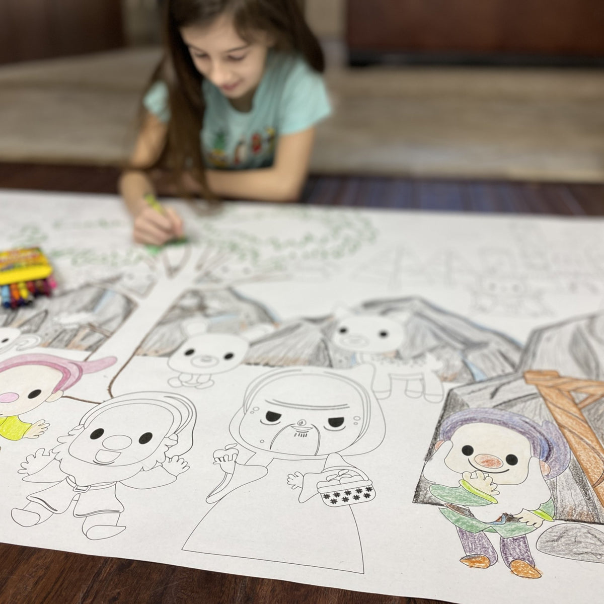 Kids coloring the Snow White Table Size Coloring Sheet at home