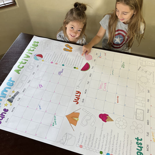 Kids coloring the Summer Activity Calendar Coloring Sheet at home