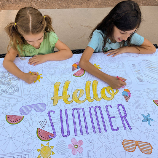 Kids coloring the Summer Table Size Coloring Sheet at home
