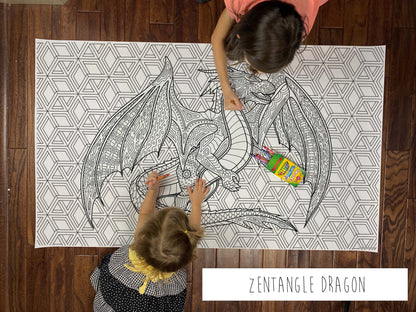 Child coloring the Zentangle Dragon giant coloring sheet on a wood floor with crayons