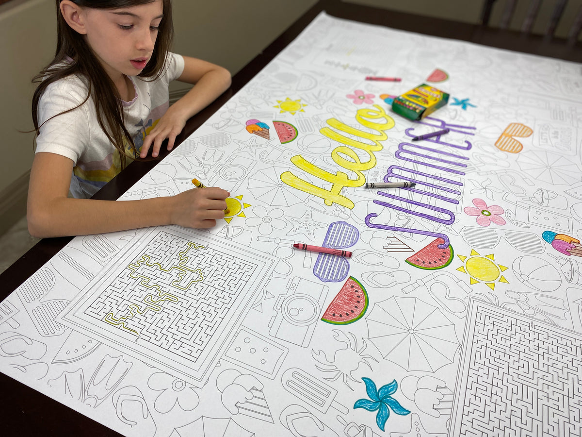 The Summer giant coloring sheet being colored in with markers at a table