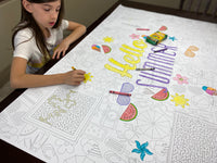Thumbnail for The Summer giant coloring sheet being colored in with markers at a table