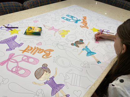 The Ballet giant coloring sheet being colored in with markers at a table