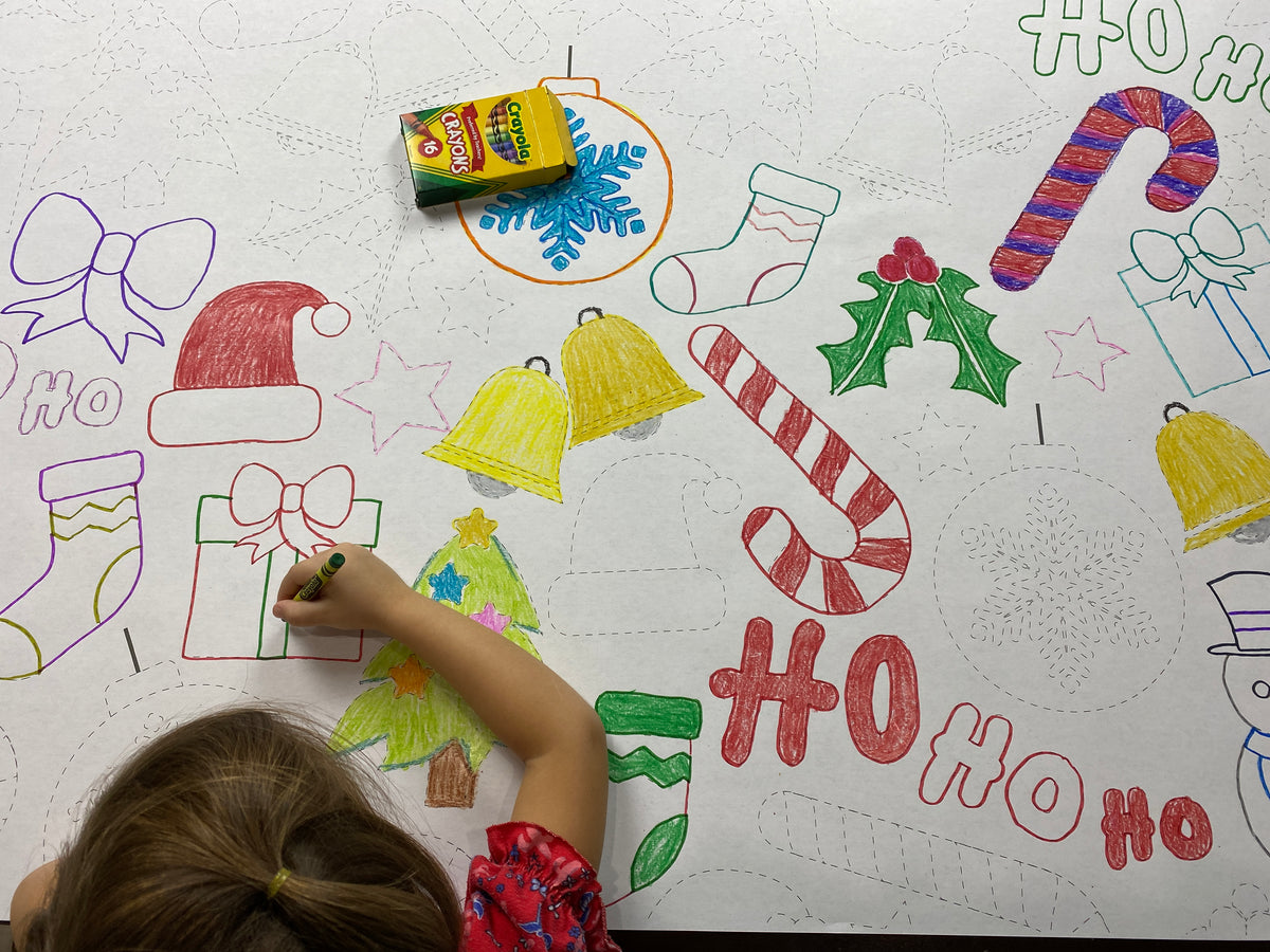 Close-up of the Santa Trace and Color coloring sheet colored in with markers