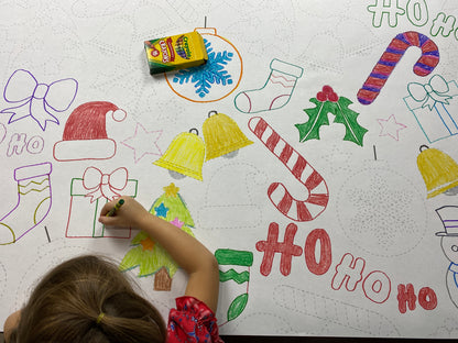 Close-up of the Santa Trace and Color coloring sheet colored in with markers