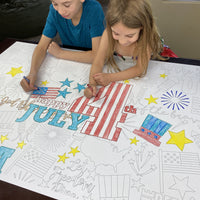 Thumbnail for The 4th of July giant coloring sheet being colored in with markers at a table