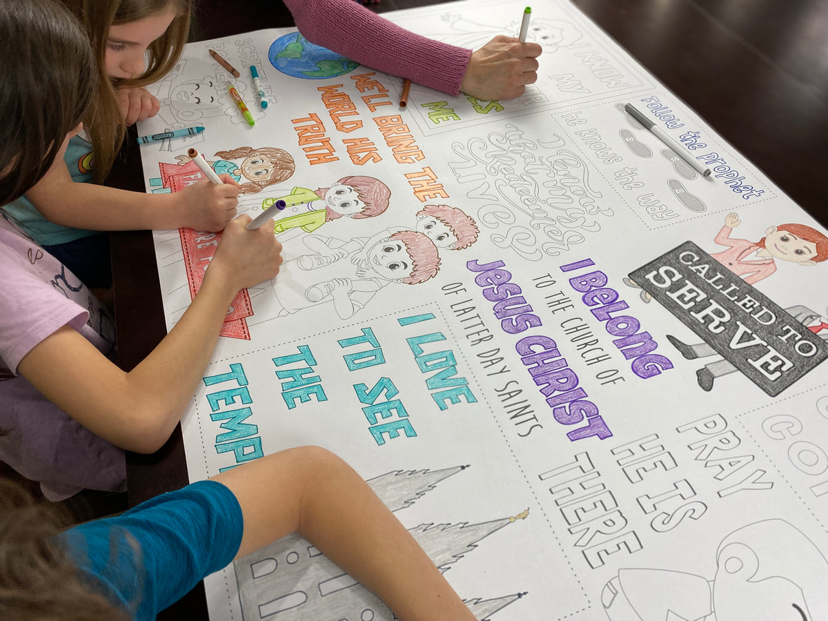 The I love General Conference giant coloring sheet being colored in with markers at a table