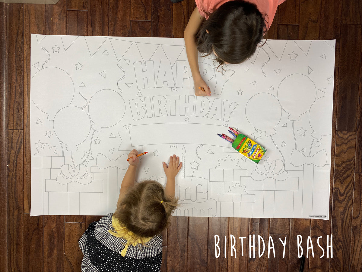 Child coloring the Birthday Bash giant coloring sheet on a wood floor with crayons