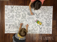 Thumbnail for Child coloring the Easter Gnomes giant coloring sheet on a wood floor with crayons