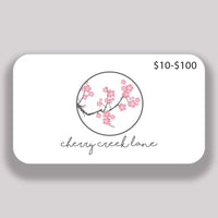 Thumbnail for Cherry Creek Lane gift card with the cherry blossom logo