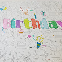 Thumbnail for Close-up of the Happy Birthday coloring sheet colored in with markers